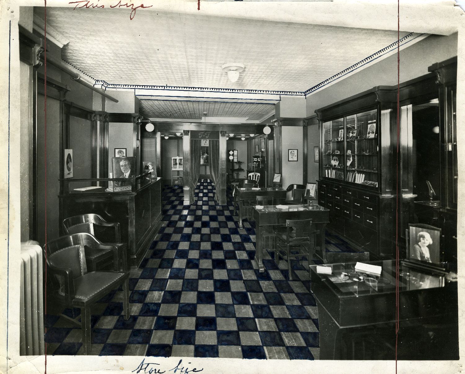 Archive photograph of the interior of the Tait-Favreau optometrist shop in Montreal, with display cases and fitting chairs.